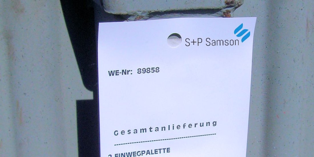 GRAPHIPLAST material label on box, attached by clip